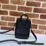 Gucci Knockoff 658553 Luxury GG embossed mini bag in black/white leather