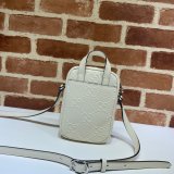 Gucci Knockoff 658553 Luxury GG embossed mini bag in black/white leather