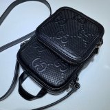 Gucci Knockoff 658553 Luxury GG embossed mini bag in black/white leather