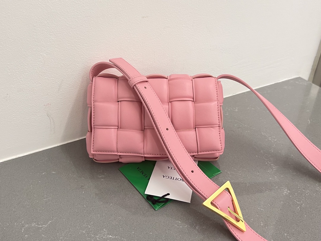 Bottega-Veneta-Padded-Cassette-Intreccio-Leather-Cross-body-Bag-Pink.jpg