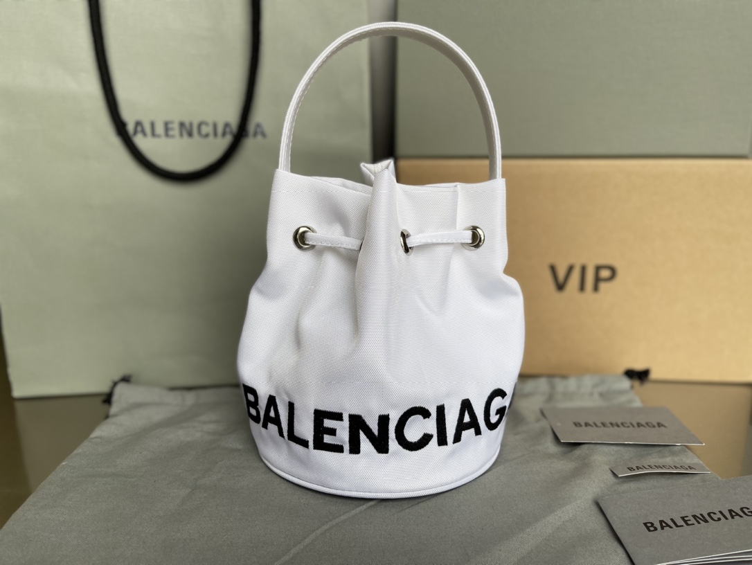 Copy-Balenciaga-Wheel-XS-Drawstring-Bucket-Bag-in-White.jpg