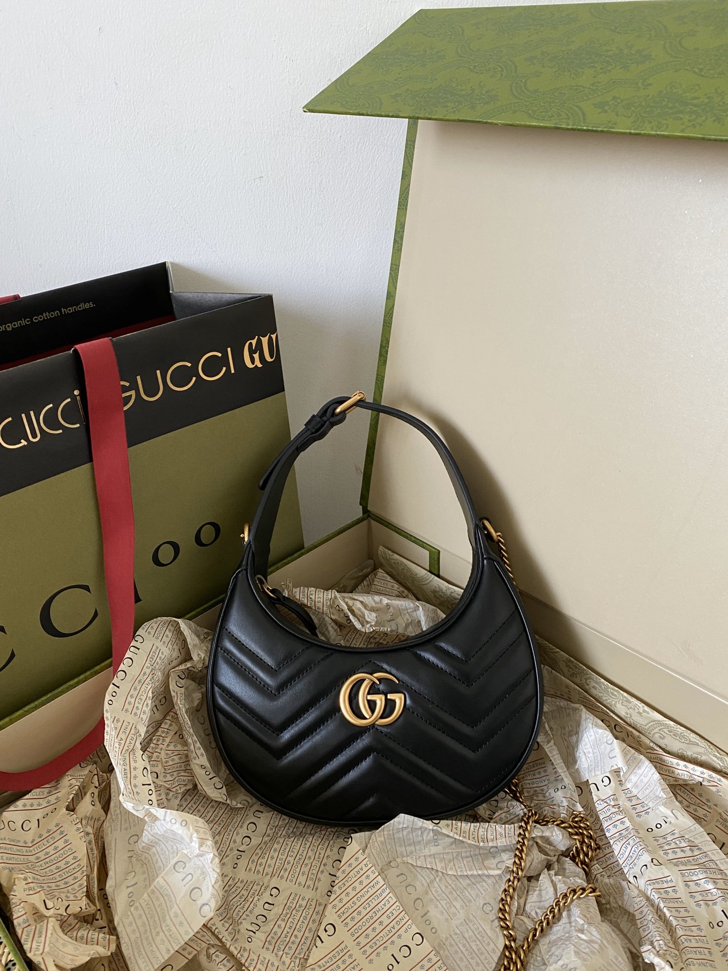 Gucci-GG-Marmont-Half-Moon-Shaped-Mini-Bag-Black-699514-1.jpg