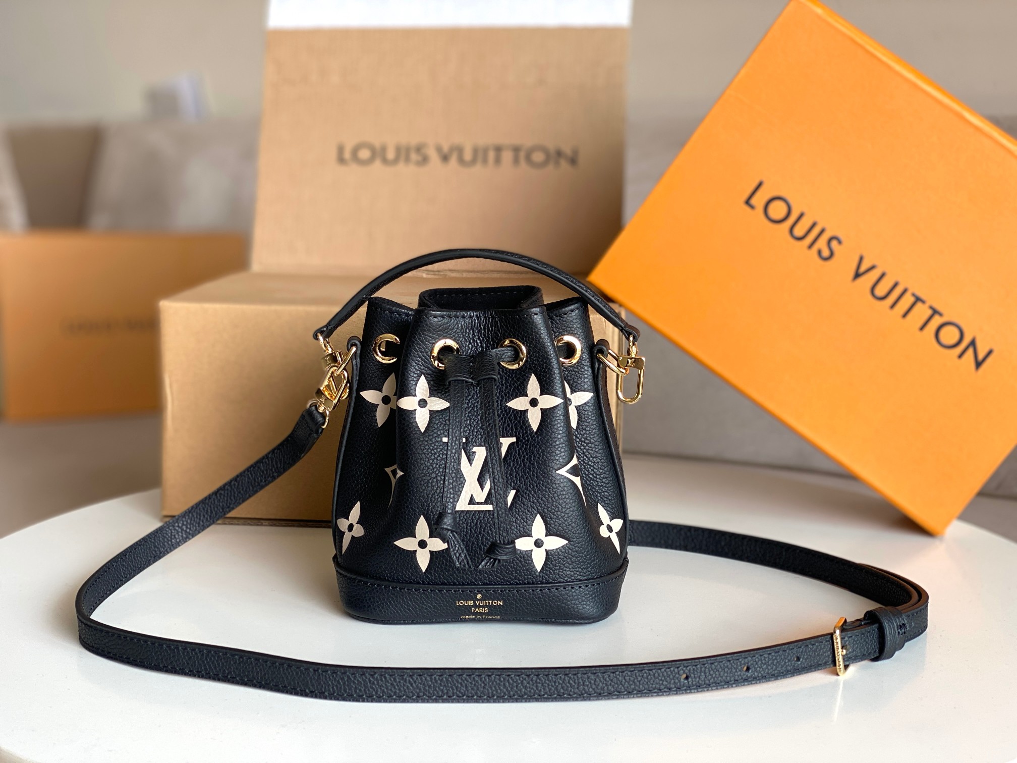 Louis-Vuitton-M46448-Nano-Noe-Monogram-Empreinte-embossed-supple-Grained-Cowhide-Leather.jpg