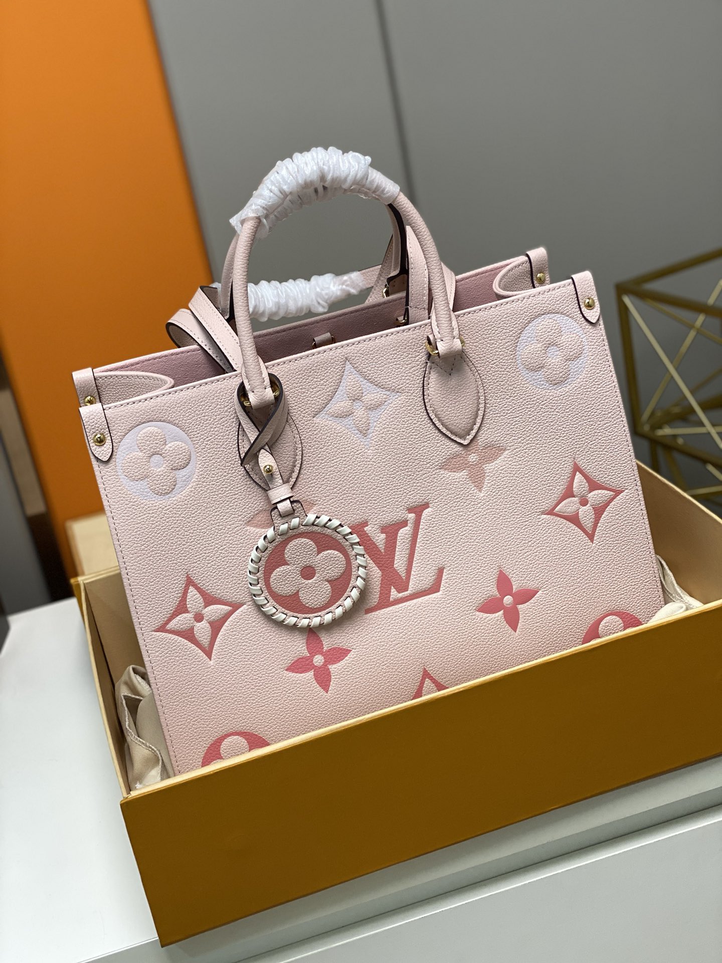 Replica-Louis-Vuitton-M45595-Onthego-PM-Embossed-Grained-Cowhide-Leather-Pink.jpg