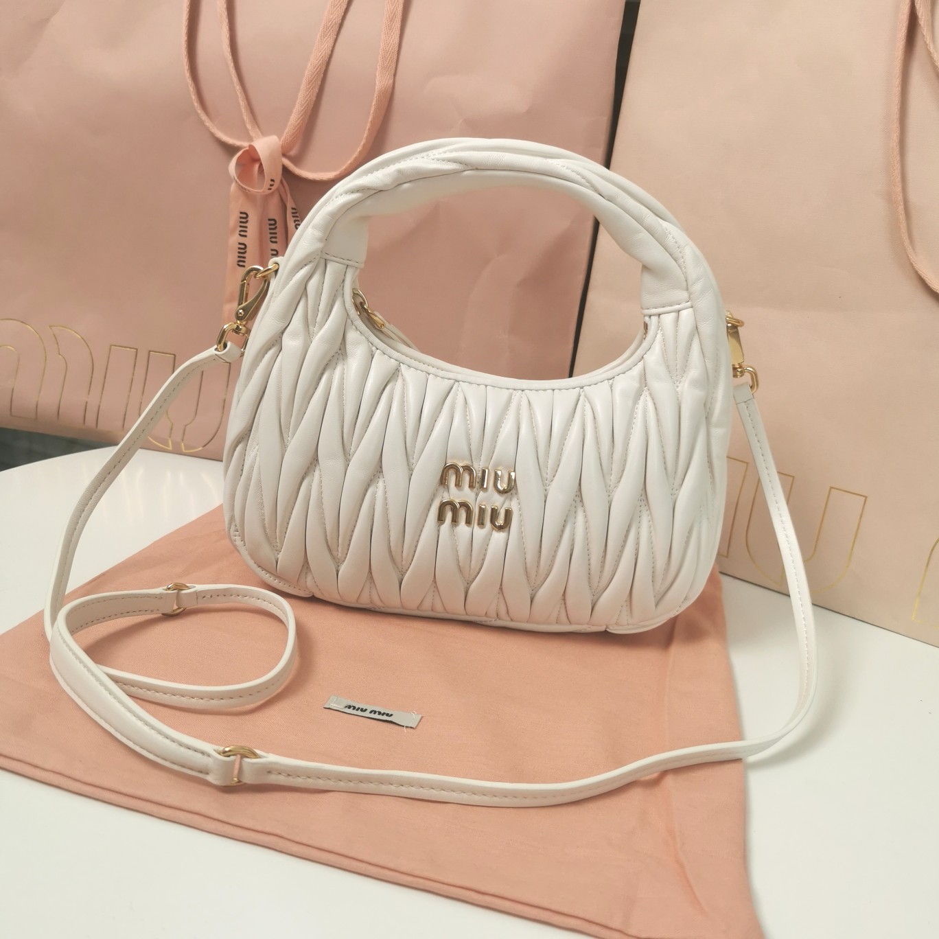 MiuMiu-5BC125-Miu-Wander-Matelasse-Satin-Mini-Hobo-Bag-White.jpg