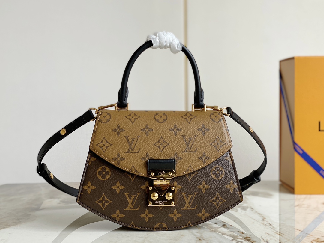 Louis-Vuitton-M46548-Tilsitt-handbag-in-Monogram-and-Monogram-Reverse-canvas.jpg