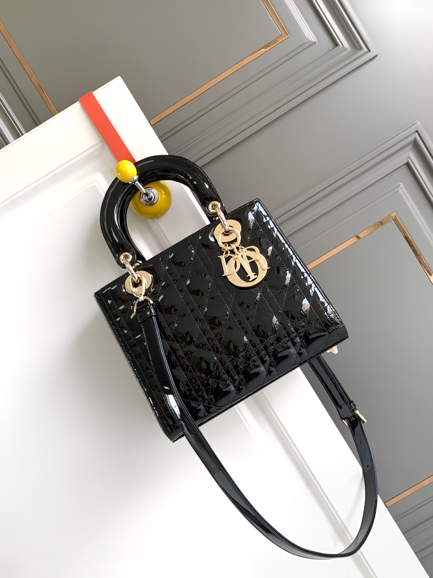 Large-Lady-Dior-Bag-Black-Patent-Cannage-Calfskin-With-Gold-Hardware-24cm.jpg