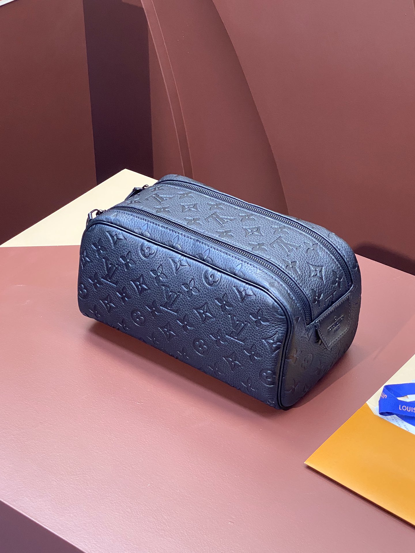 Louis-Vuitton-M82576-Dopp-Kit-Embossed-Taurillon-Monogram-Cowhide-Leather-Blue.jpg