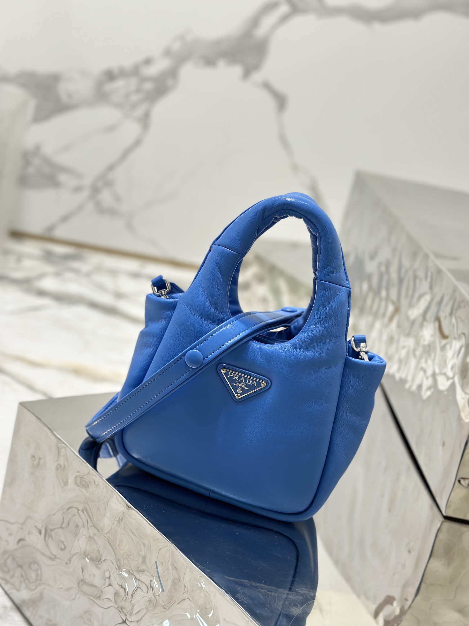 Prada-1BA359-Small-Padded-Prada-Soft-Nappa-Leather-Bag-Blue.jpg