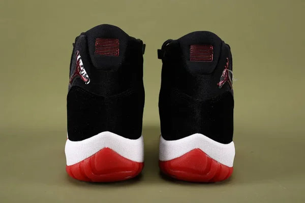 the both heels of the left side of Wmns Air Jordan 11 Retro 'Bred Velvet'