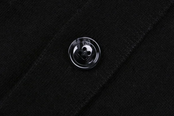 Ami Embossed Heart Embroidery Basic Polo Sweater Black7.jpeg