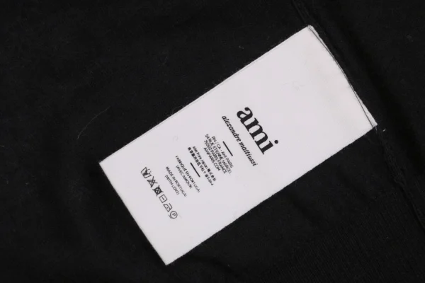 Ami Embossed Heart Embroidery Basic Polo Sweater Black9.jpeg