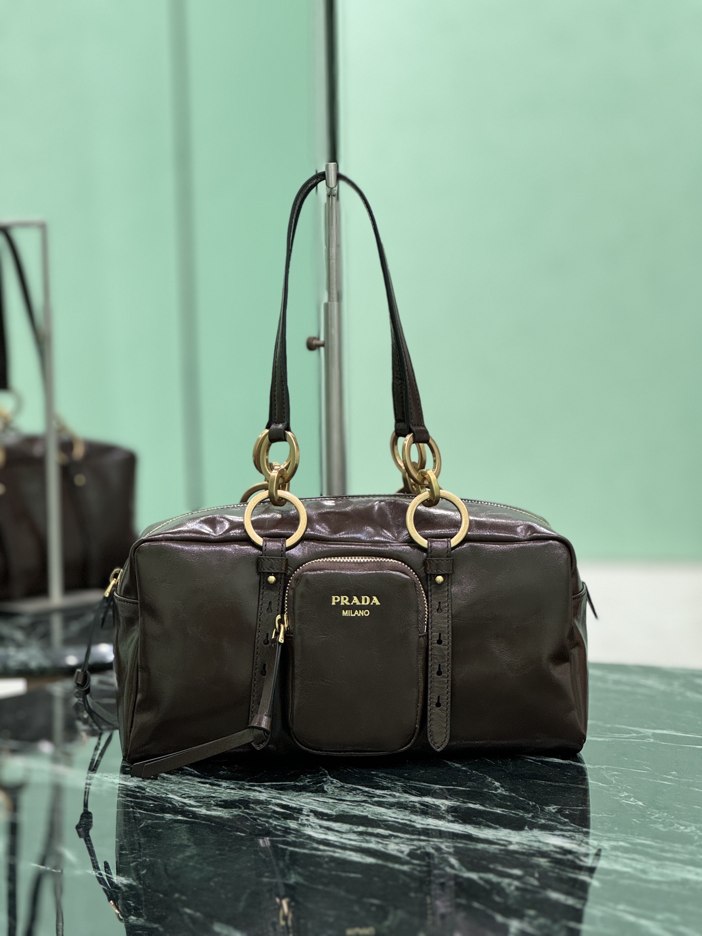 Prada-1BB138-Dangle-Leather-Top-handle-Bag-Brown.jpg
