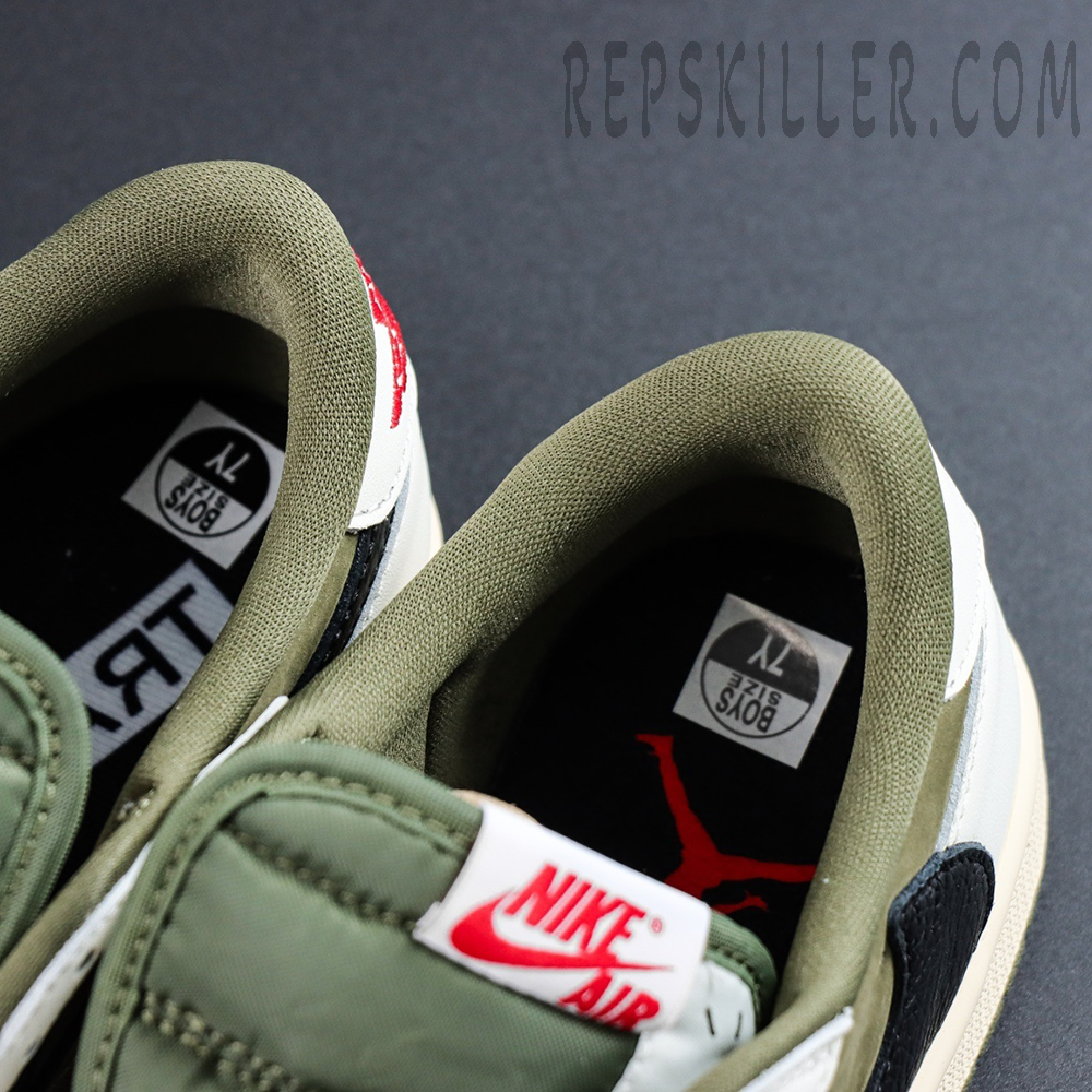 Close-up of the inner lining and insole branding on the Travis Scott x Air Jordan 1 Low Reverse Olive.
