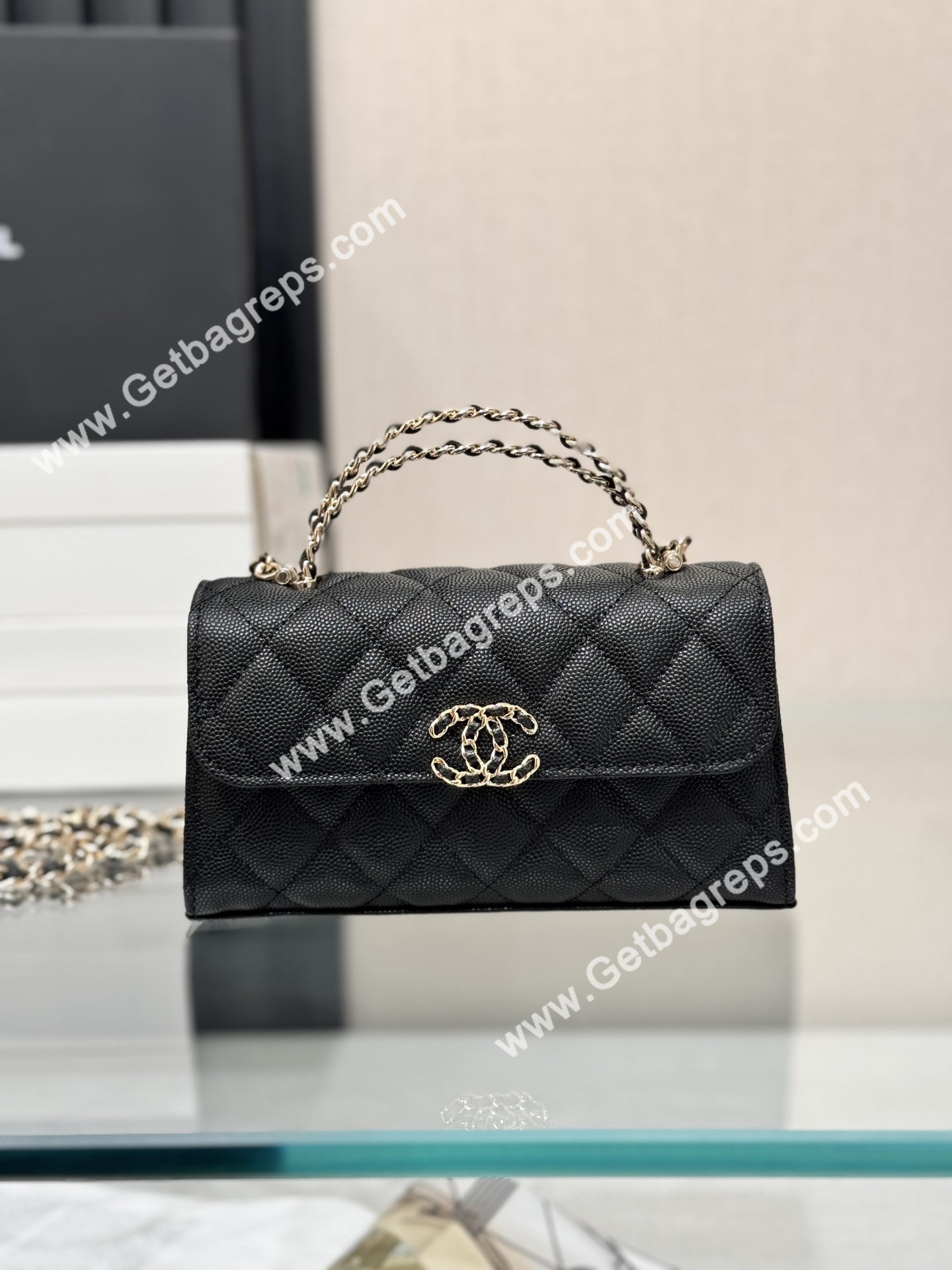 CHANEL-Top-Handle-Phone-Holder-With-Chain-Black-Caviar-Quilted.jpg
