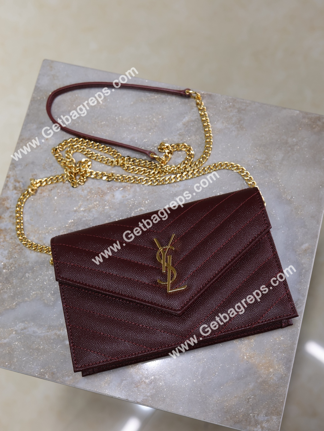 YSL-Monogram-Large-Wallet-on-Chain-in-Grained-Leather-Wine.jpg