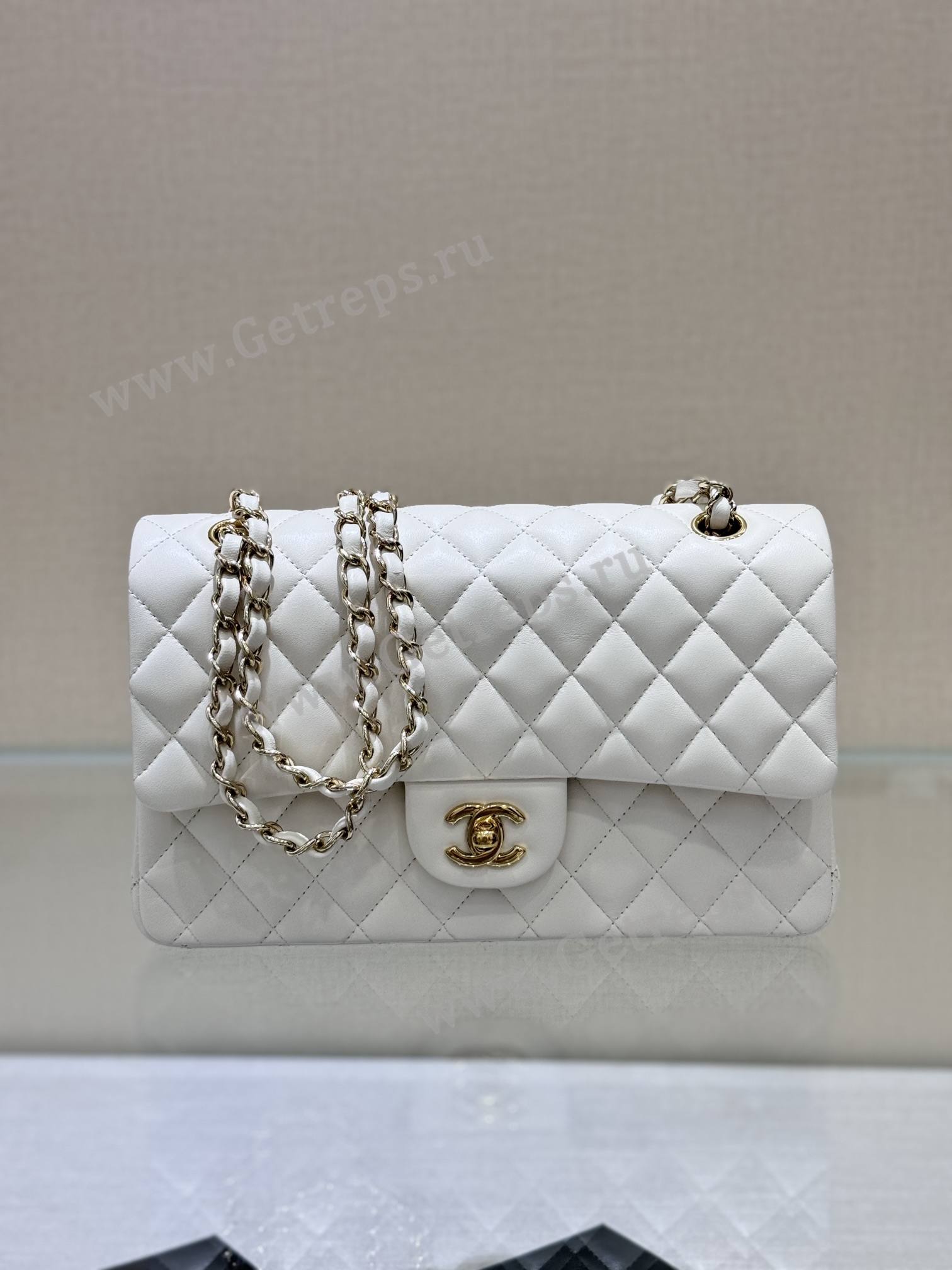 Chanel-Classic-Flap-25cm-White.jpg