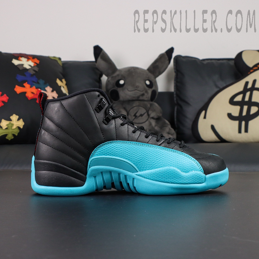 Lateral side view of Air Jordan 12 Retro ‘Gamma Blue’ focusing on blue textured mudguard and stitched black leather upper.