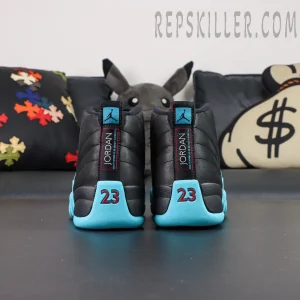 Rear heel view of Air Jordan 12 Retro ‘Gamma Blue’ featuring iconic “23” in red and black Jordan pull tabs.