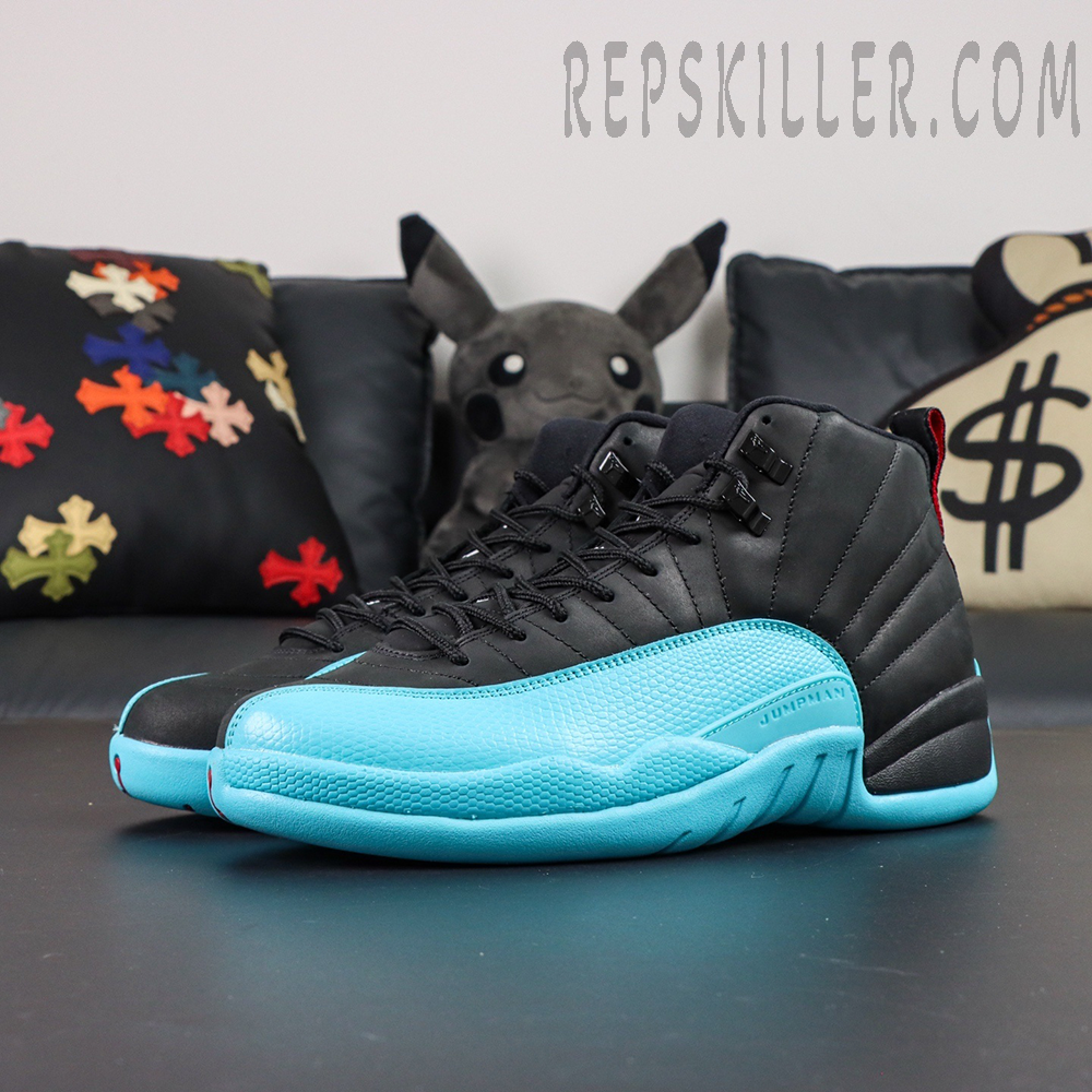 Front angled display of Air Jordan 12 Retro ‘Gamma Blue’ highlighting contrast between black upper and bright blue mudguard.