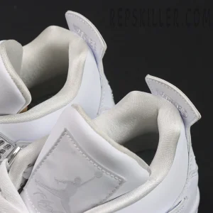 Air Jordan 4 Retro 'Pure Money' 2017 tongue back tabs with stitched 'Pure$' branding