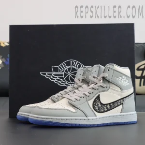 Dior x Air Jordan 1 High sneakers displayed in front of the signature Air Dior box.
