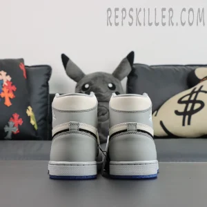 Rear heel view of Dior x Air Jordan 1 High featuring embroidered Air Dior Wings logo.