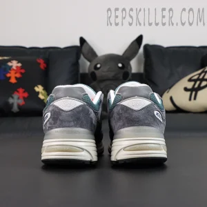 Kith x New Balance 991v2 Made in England ‘Osaka Pack’ rear heel view with V2 badge and co-branded details