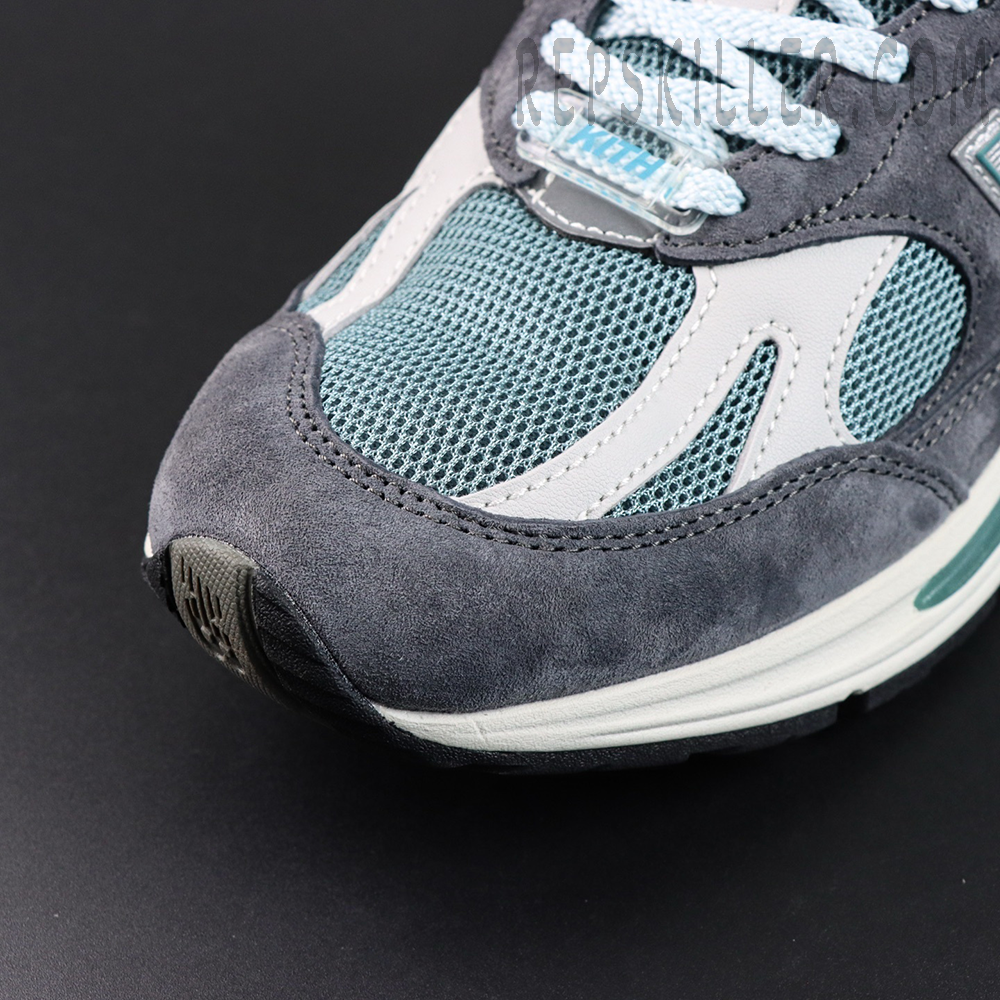 Kith x New Balance 991v2 ‘Osaka Pack’ close-up of left toe box with mesh and leather panels