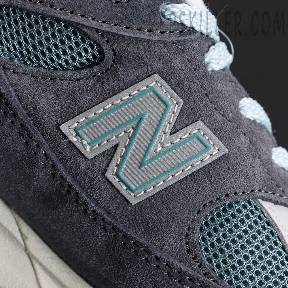 Kith x New Balance 991v2 ‘Osaka Pack’ mid-panel showing stitched N logo in grey and teal