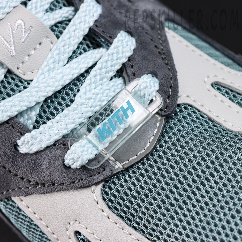 Detailed look at Kith x New Balance 991v2 ‘Osaka Pack’ shoelaces with custom clear KITH lace lock