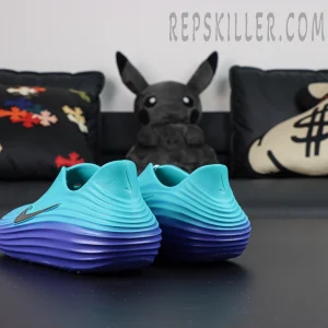 Rear angle of the Nike ReactX Rejuven8 ‘Dusty Cactus Persian Violet’, showing sculpted foam heel and embedded Nike branding.