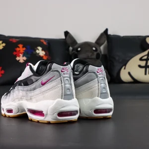 Nike SB x Air Max 95 ‘Cactus Flower’ rear angle showing both heels with magenta Air units.