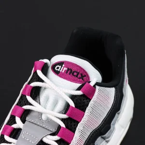 Nike SB x Air Max 95 ‘Cactus Flower’ tongue logo close-up with classic oval magenta Air Max patch.