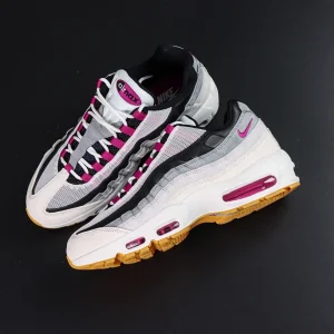 Nike SB x Air Max 95 ‘Cactus Flower’ top-down flat lay of both shoes showing lace system and color contrast.