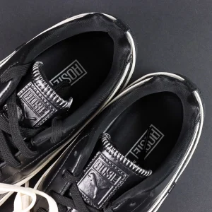 Rosé x Wmns Speedcat Premium ‘Black’ overhead close-up showing co-branded details with Rosé insole print and embossed Rosé-PUMA tongue logo with zigzag stitching.