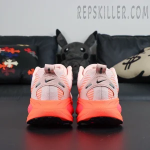 Nike Vomero 18 'Atmosphere Pink' back view highlighting pull tab and heel logo