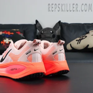 Nike Vomero 18 'Atmosphere Pink' rear angle showing heel support and ZoomX midsole