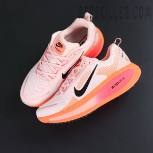 Nike Vomero 18 'Atmosphere Pink' flat lay top-down view with overlapping pair