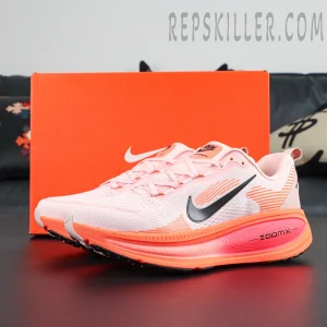 Nike Vomero 18 'Atmosphere Pink' displayed with original orange Nike shoebox