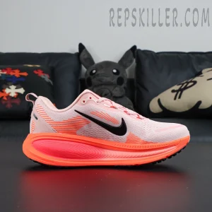 Nike Vomero 18 'Atmosphere Pink' medial side product view against black backdrop