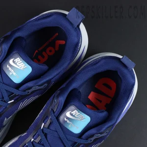 Nike Vomero 18 ‘Blue Void Metallic Silver’ close-up of insoles with blue tongue label and red road graphic