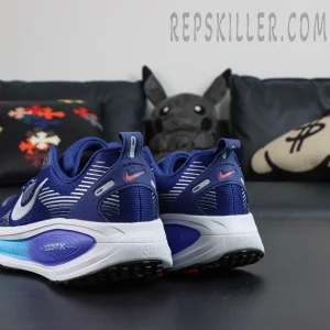 Nike Vomero 18 ‘Blue Void Metallic Silver’ angled heel view featuring dual Swoosh and supportive heel clip