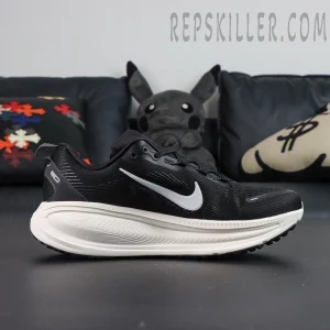 Nike Vomero 18 Extra Wide 'Black Coconut Milk' lateral side view on black background