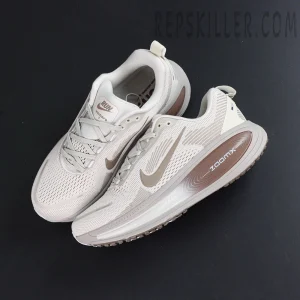 Nike Zoom Vomero 18 ‘Pale Ivory Red Sepia’ top-down layout showcasing mesh structure and lace arrangement