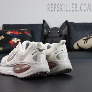 Nike Zoom Vomero 18 ‘Pale Ivory Red Sepia’ angled heel view highlighting layered heel panel and Swoosh detail