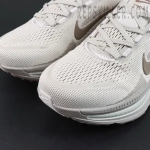 Nike Zoom Vomero 18 ‘Pale Ivory Red Sepia’ toe box macro view with breathable mesh and off-white overlays