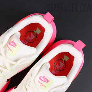Nike Vomero 18 ‘Sail Hyper Pink’ top-down close-up of insole and tongue branding
