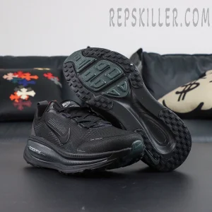 Nike Vomero 18 ‘Triple Black’ outsole display featuring durable black rubber and full-length traction grooves