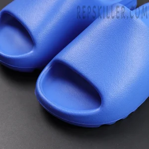 Yeezy Slides ‘Azure’ toe box close-up showing smooth EVA construction